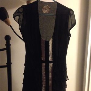Black dress with white detail. Size Small.